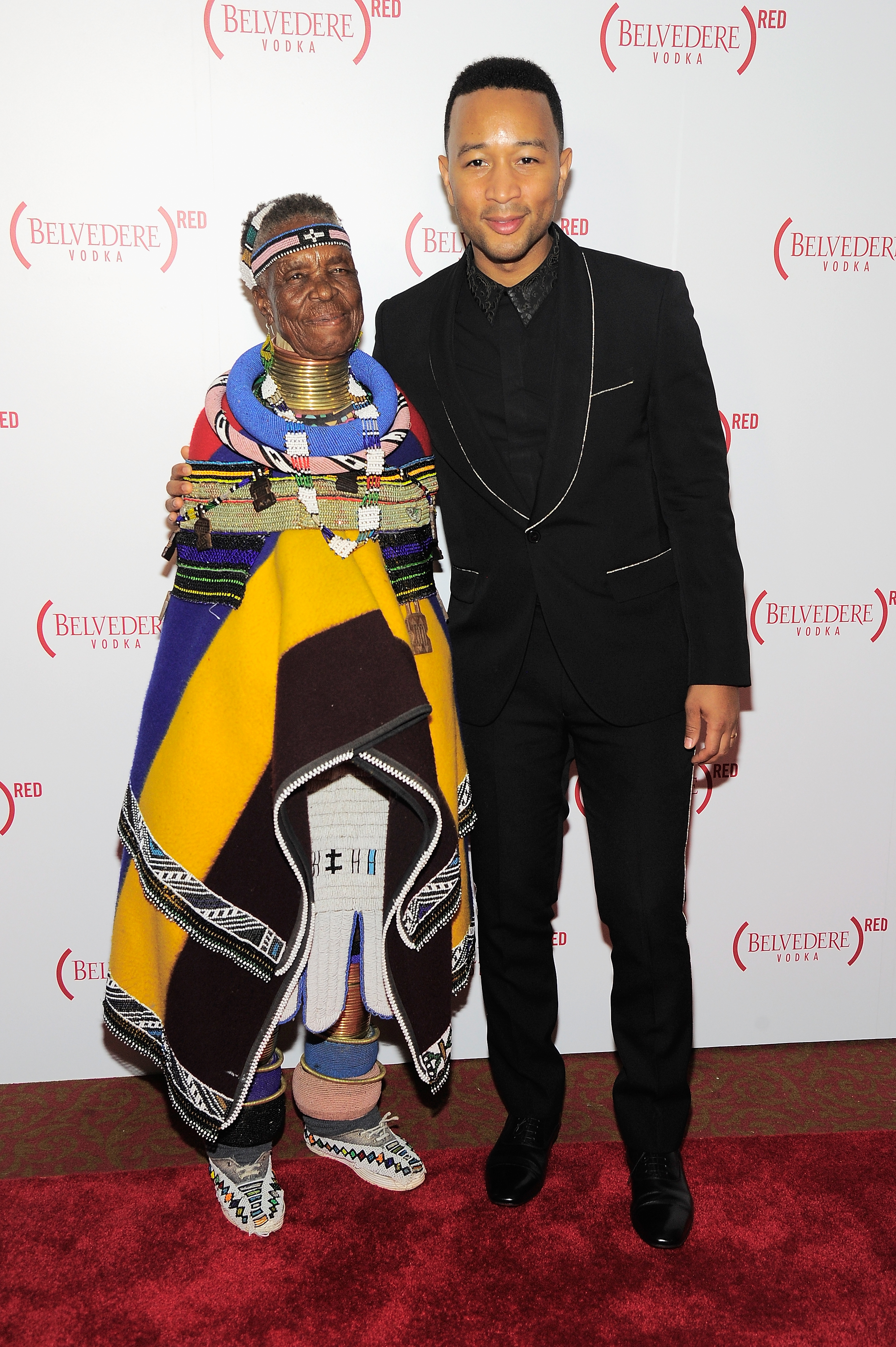 NEW YORK, NY - AUGUST 27: Artist Esther Mahlangu and recording artist John Legend attend the Belvedere Presents One Night for Life with John Legend at the Apollo Theater at The Apollo Theater on August 27, 2016 in New York City.  (Photo by Owen Hoffmann/Patrick McMullan via Getty Images)